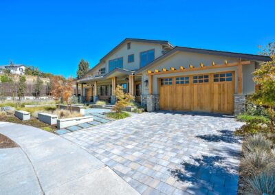 Custom built home with stone driveway