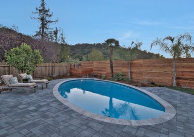 Pool with privacy fencing