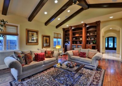 Living room with dark wood beams