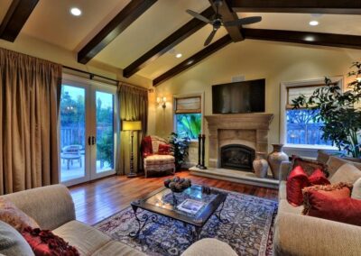 Living room with dark wood beams