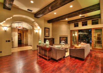 Open living room with large wood beams