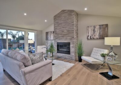 Muted colored living room with fireplace