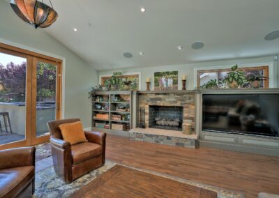 Living room with built-ins and fireplace