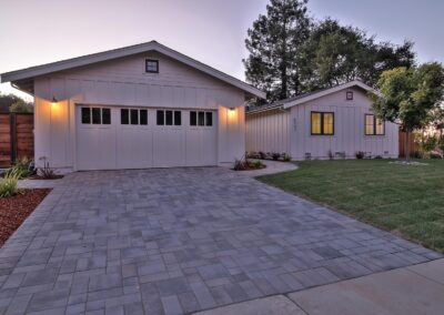 Custom built home with paver driveway