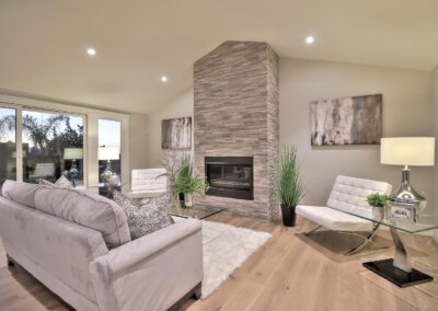 Muted colored living room with fireplace