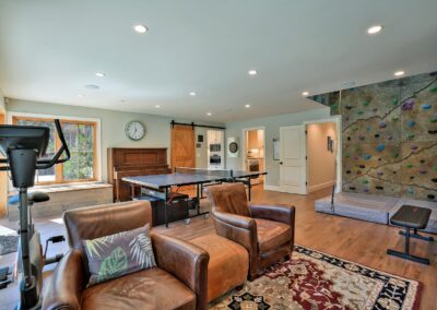 Recreation room with rock wall