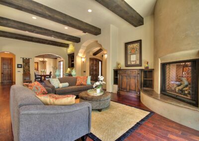 Large open living room with wood beams