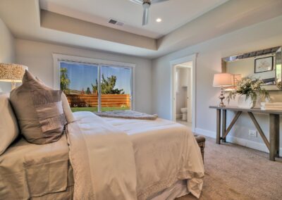 Bedroom with recessed ceiling