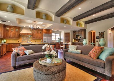 Large open living room with wood beams